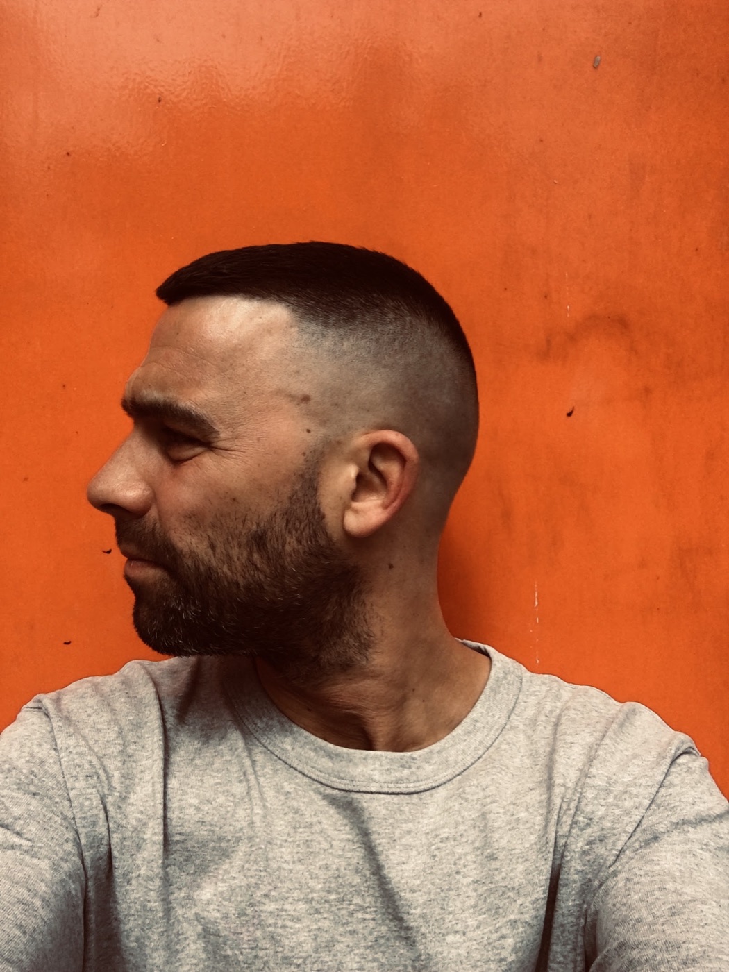 High skin fade with a full beard shaped and lined at Crew Cuts, Hackney E8