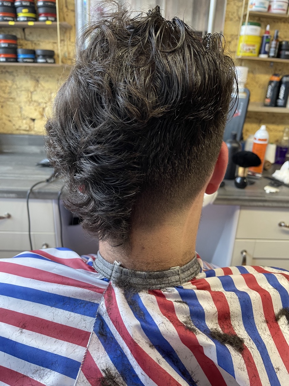 Longer layered cut, washed and styled at Crew Cuts barbershop, Hackney